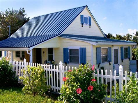 interactive yellow houses with metal roof|yellow metal roof exterior homes.